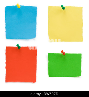 pushpin and ragged note paper isolated on white background Stock Photo