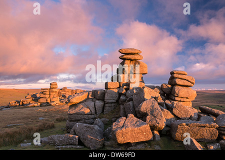 Rich evening sunlight illuminates Great Staple Tor at sunset, Dartmoor, Devon, England. Winter (January) 2014. Stock Photo