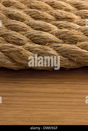 ship ropes on wooden background Stock Photo