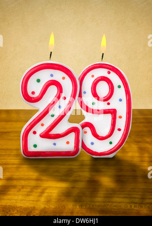 Burning birthday candles number 29 Stock Photo