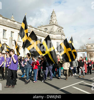 Cardiff, UK. 1st March, 2014. People take part in the St Davids Day parade in Cardiff, Wales, UK. Credit:  Robert Convery/Alamy Live News. Saint David's day patron saint Wales. Stock Photo