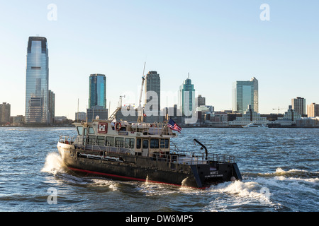 U.S. Army Corps of Engineers Patrol Boat, Hudson River in Front of Jersey  City skyline, NYC, USA Stock Photo