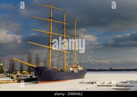 Newly retrofitted Caledonia tall ship locked in ice and snow in the Toronto Harbour Lake Ontario Stock Photo