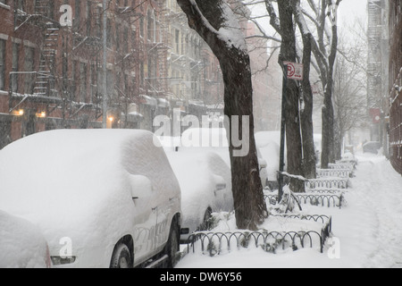 Parked cars covered with snow in New York City after heavy snowfall Stock Photo