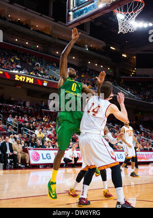 Los Angeles, CA, United States of America - March 1, 2014 Los Angeles, CA.Oregon Ducks forward (0) Mike Moser drives to the basket during the Pac 12 game between the Oregon Ducks and the USC Trojans at the Galen Center in Los Angeles, California. The Oregon Ducks defeated the USC Trojans 78-63.(Mandatory Credit: Juan Lainez / MarinMedia.org / Cal Sport Media) Stock Photo