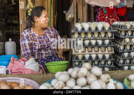 March 2, 2014 - Myawaddy, Kayin, Myanmar - An egg seller on a street in Myawaddy. Myawaddy is separated from the Thai border town of Mae Sot by the Moei River. Myawaddy is the most important trading point between Myanmar (Burma) and Thailand. (Credit Image: © Jack Kurtz/ZUMAPRESS.com) Stock Photo