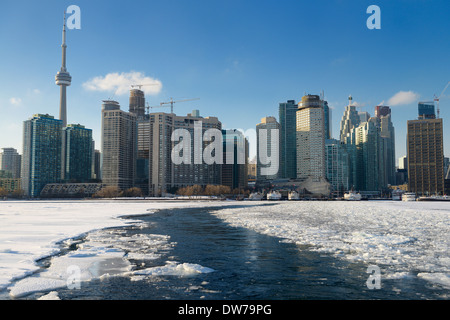 Ice breaking path of Wards Island Ferry on frozen Lake Ontario in Toronto Canada winter Stock Photo