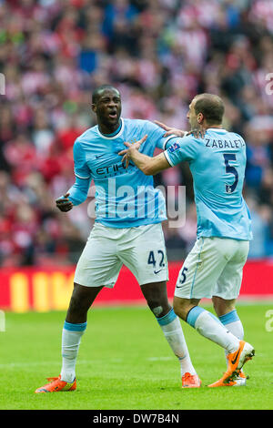 Manchester City's Yaya Toure celebrates scoring his side's second