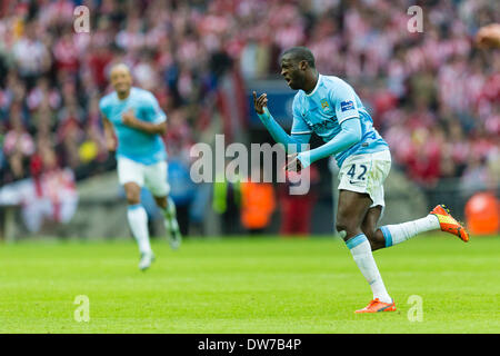 London, England. 2nd March 2014.  Manchester City's Yaya TOURE celebrates scoring his side's first goal to make it 1-1 during the Capital One Cup Final between Manchester City and Sunderland at Wembley Stadium Credit:  Action Plus Sports Images/Alamy Live News Stock Photo