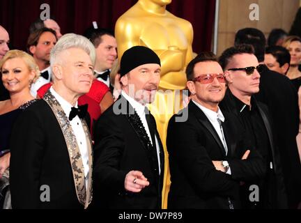 Los Angeles, CA. 2nd Mar, 2014. The Edge, Bono, Larry Mullen Jr., Adam Clayton, bandmembers from U2 at arrivals for The 86th Annual Academy Awards - Arrivals 2 - Oscars 2014, The Dolby Theatre at Hollywood and Highland Center, Los Angeles, CA March 2, 2014. Credit:  Gregorio Binuya/Everett Collection/Alamy Live News Stock Photo