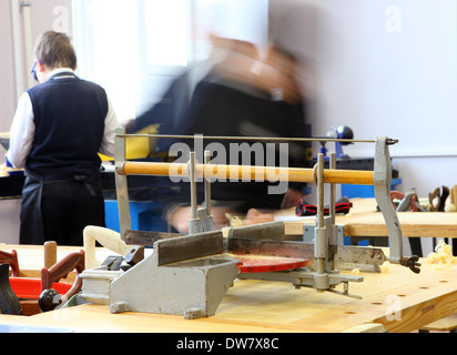 Vocational education  - male high school students take training in carpenter Stock Photo