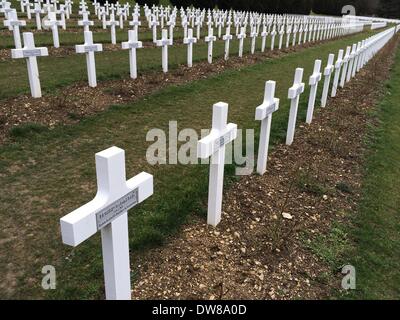 The sky is grey above the white crosses of the soldier cemetery on the battlefields of Verdun in the northeast of France. Photo: Gerd Roth/dpa Stock Photo