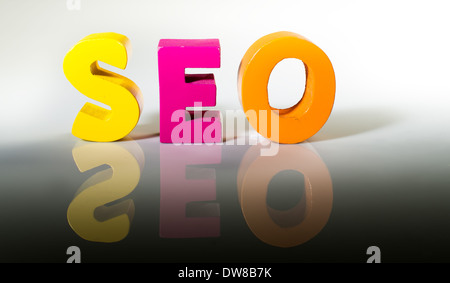 Multicolored text seo made of wood. White background Stock Photo