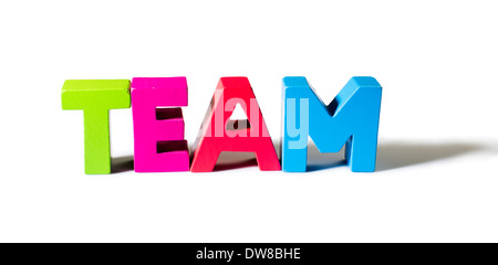 Multicolored text team made of wood. White background Stock Photo