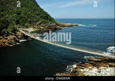 Beautiful landscape, people on Storms River suspension bridge, Tsitsikamma National Park, Eastern Cape, South Africa, travel destination, coast, beach Stock Photo