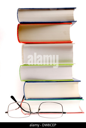 Pile of books and reading glasses Stock Photo