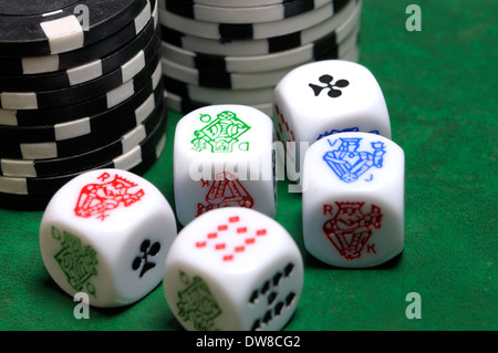 Poker dice and betting chips Stock Photo