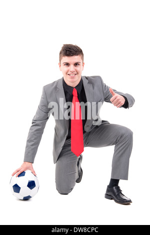 Businessman with soccer ball isolated in white Stock Photo - Alamy