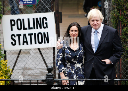 London Mayor Boris Johnson leaves the polling station after he vote for London's mayor with his wife Marina Wheeler at his local polling station in Islington, London, May 3, 2012. Stock Photo