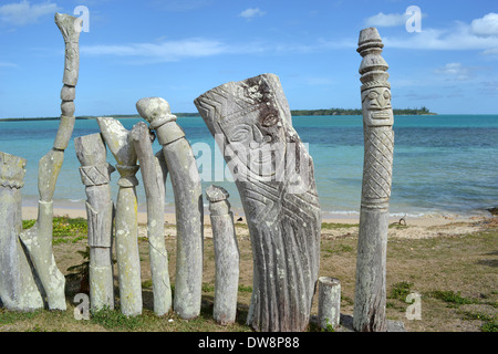 Wood sculptures of Kunie origin by St. Maurice Bay, Vao, Iles des Pins, New Caledonia, South Pacific Stock Photo