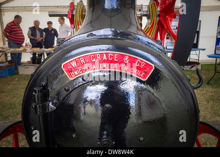 Front of old 1900s British steam engine with importer's name plate in Chile Stock Photo