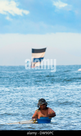 Malagasy women fishing in the Mozambique channel. Stock Photo