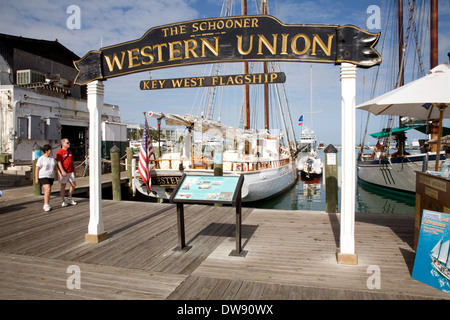 Many old sailing vessels, including the schooner Western Union, tie up in the Historic Seaport of Key West, Florida, USA Stock Photo