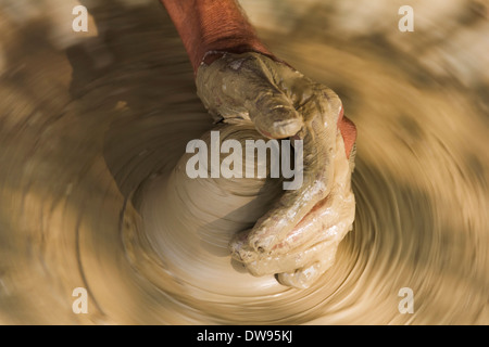 1 indian villager making pots Stock Photo