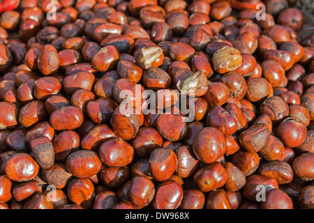 Chinese Chestnuts (Castanea mollissima) for sale on a market, Chiang Mai, Chiang Mai Province, Thailand Stock Photo