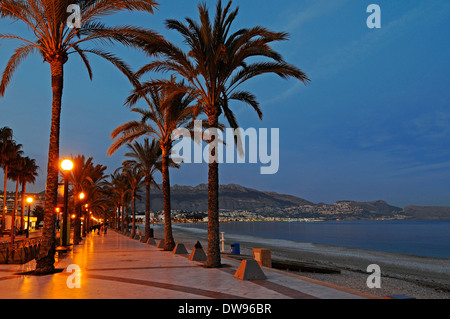 Beach promenade at dusk, Albir, Altea at the back, coast, Costa Blanca, Province of Alicante, Spain Stock Photo