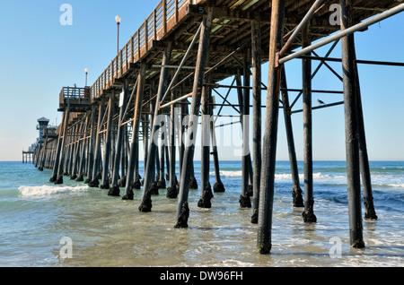 Historic Oceanside Pier at the onset of high tide, Oceanside, San Diego County, California, United States Stock Photo