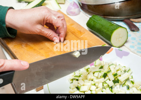cook cucumber cut into small pieces Stock Photo