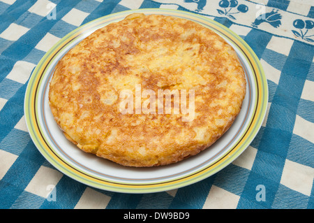 omelette on a blue checked tablecloth Stock Photo