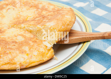 omelette on a blue checked tablecloth Stock Photo