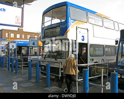 People boarding a 700 Coastliner Stagecoach bus at Chichester bus station West Sussex UK Stock Photo