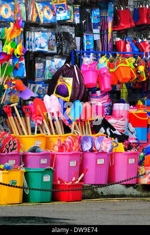 A colourful display in a seaside shop with masses of buckets and spades UK Stock Photo