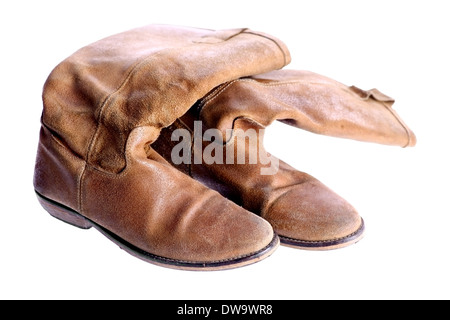 Used vintage brown leather boots isolated on white background Stock Photo