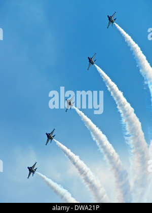 ROKAF's Black Knights aerobatic team enthralling visitors at the 2014 Singapore airshow with its high precision maneuvers Stock Photo