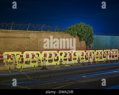 Barriers and traffic cones at roadside Stock Photo