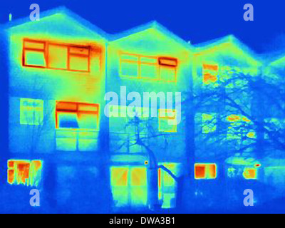 Thermal image of house, showing loss of heat from open windows Stock Photo