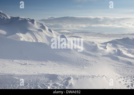 A view of snowfields back towards the island of Mageroya Norway from the 'North cape' visitor centre Stock Photo