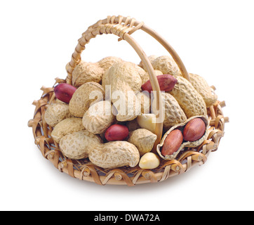 Peanuts in wicker basket on white background Stock Photo