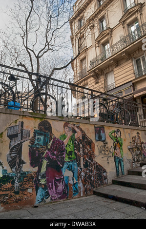 Some graffiti, mural of photographers, in Paris Stock Photo