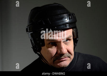 portrait of a man in hockey helmet Stock Photo