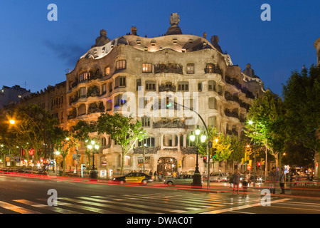 Casa Mila by Gaudi at twilight, laterne,Passeig de Gracia, Stock Photo