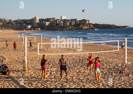 Manly North Steyne Beach at dawn with women playing beach volleyball Northern Beaches Sydney New South Wales NSW Australia Stock Photo