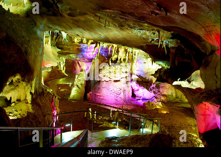 Sataplia cave in Georgia illuminated by colorful lights Stock Photo