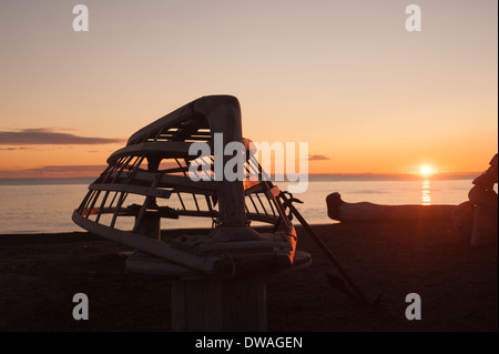 Horizontal photo of Whaling boat made of driftwood on the edge of the Chukchi Sea, Barrow, Alaska Stock Photo