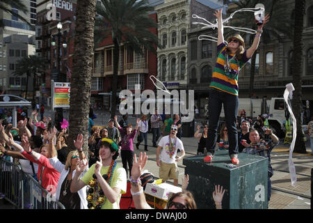 New Orleans, LOUISIANA, USA. 1st Mar, 2014. Chelsea Stone tries to grab beads during the Krewe of Tucks Parade in New Orleans, Louisiana on March 1, 2014. New Orleans is celebrating Mardi Gras which cullminates on Fat Tuesday and leads into the season of lent. © Dan Anderson/ZUMAPRESS.com/Alamy Live News Stock Photo