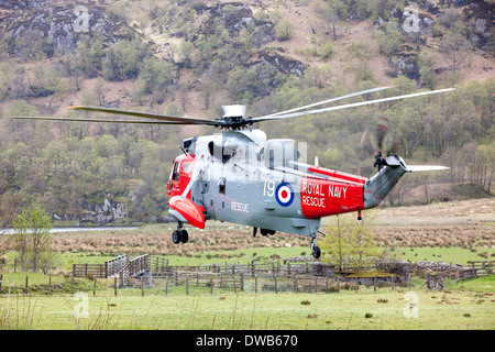 Royal Navy rescue helicopter taking off in the Scottish highlands Stock Photo